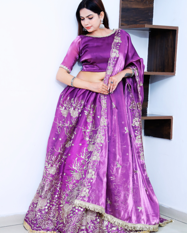 An Allure Dark Voilet Heavy Embroidery Lehenga Set