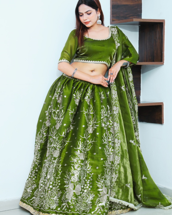 An Allure Emerald Green Heavy Embroidery Lehenga Set